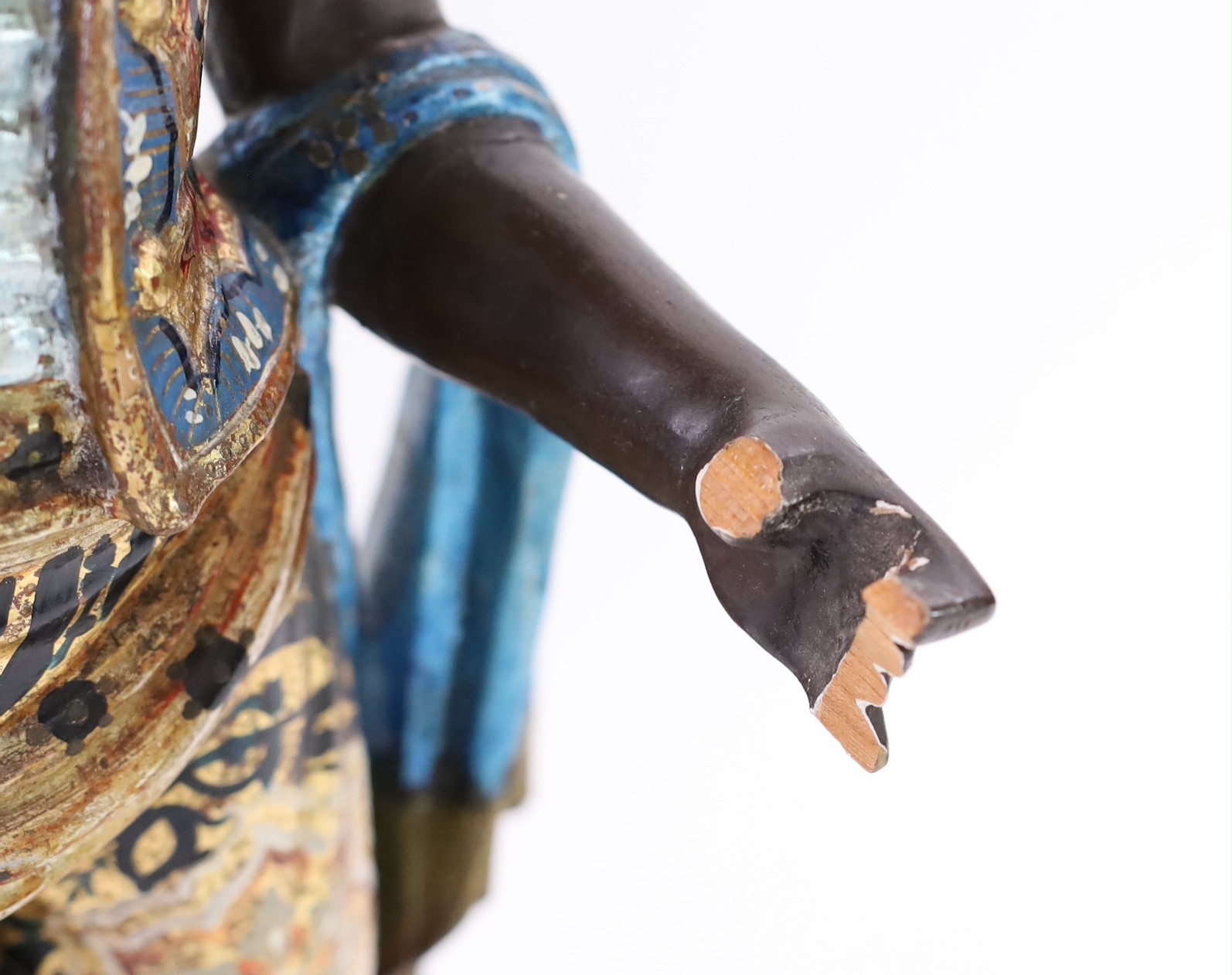 A 19th century Venetian carved wood and polychrome gondolier blackamoor table, width 33cm height 103cm